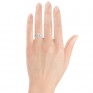 Heart shaped solitaire engagement ring on hand Heart shaped solitaire engagement ring on hand