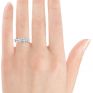 Showing a plain wedding ring sat with the 1 carat version of the Princess cut trilogy ring on the hand Showing a plain wedding ring sat with the 1 carat version of the Princess cut trilogy ring on the hand