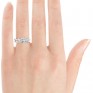 Showing a plain wedding ring sat with the 1 carat version of the Princess cut trilogy ring on the hand Showing a plain wedding ring sat with the 1 carat version of the Princess cut trilogy ring on the hand