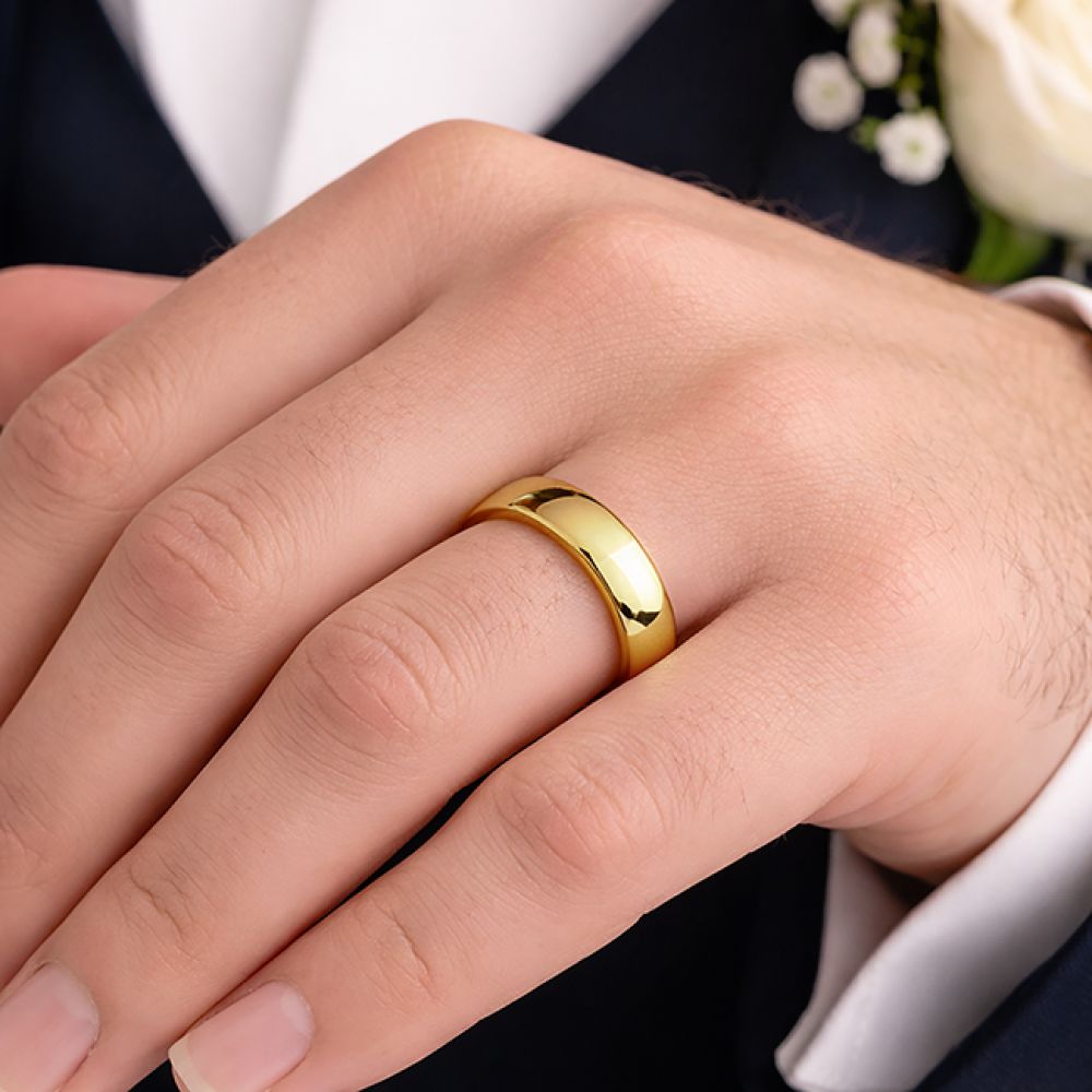 Medium slight court wedding ring 6mm shown on finge