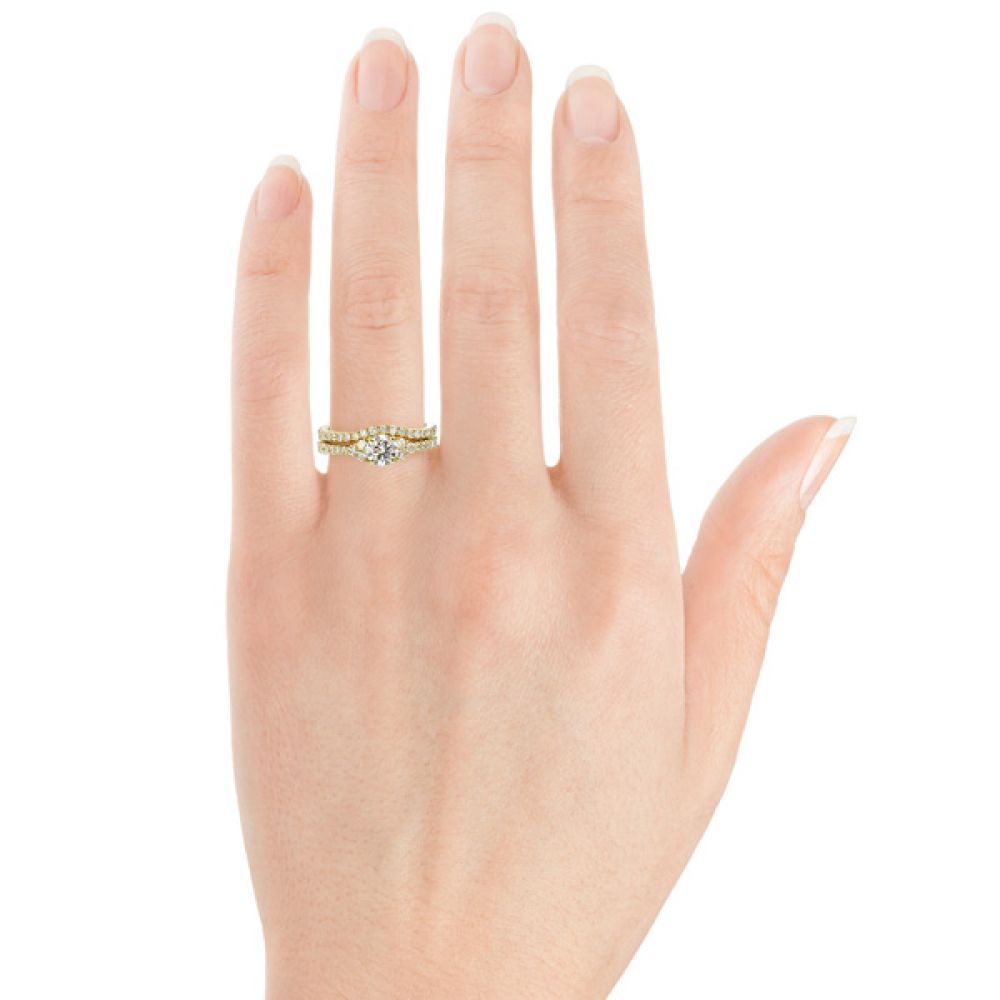 Christie diamond engagement ring shown on the finger Christie diamond engagement ring shown on the finger