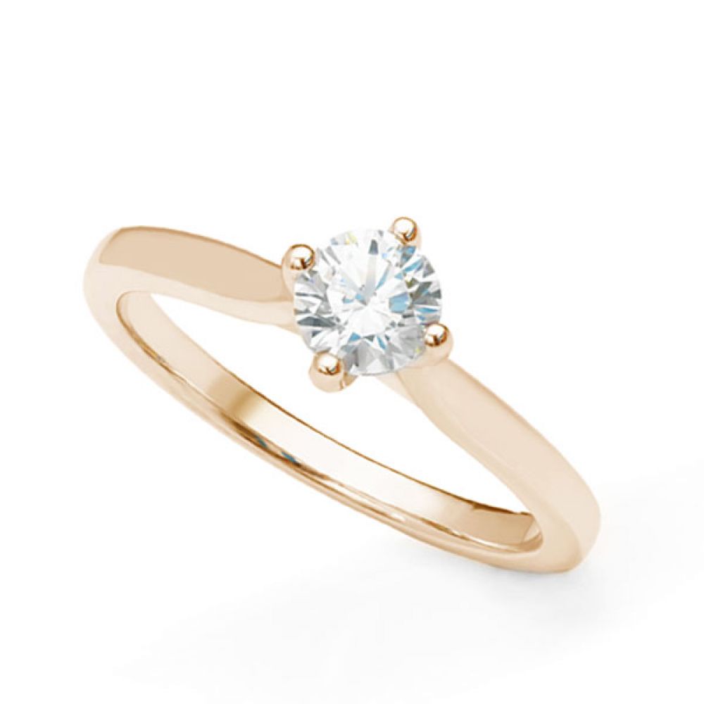 Round solitaire diamond engagement ring with wedding ring friendly setting Round solitaire diamond engagement ring with wedding ring friendly setting